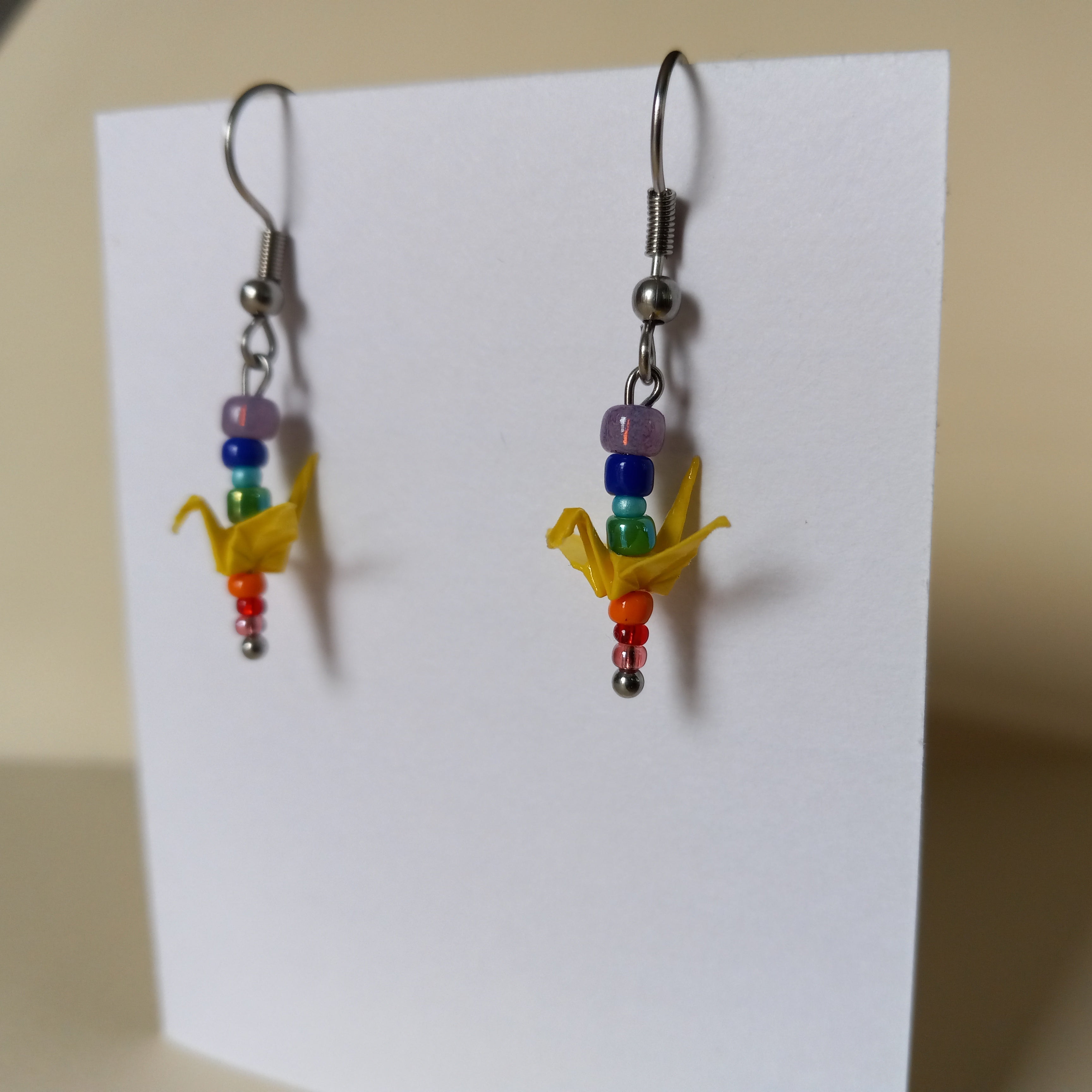 yellow birds in a tiny rainbow