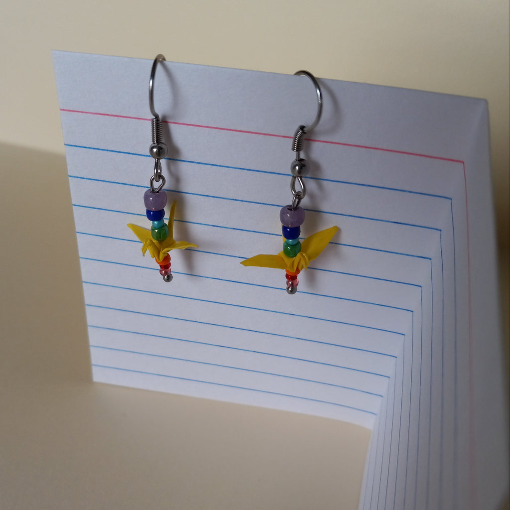 yellow birds in a tiny rainbow