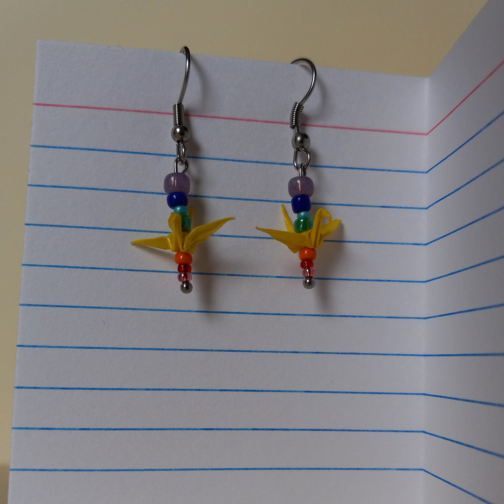 yellow birds in a tiny rainbow