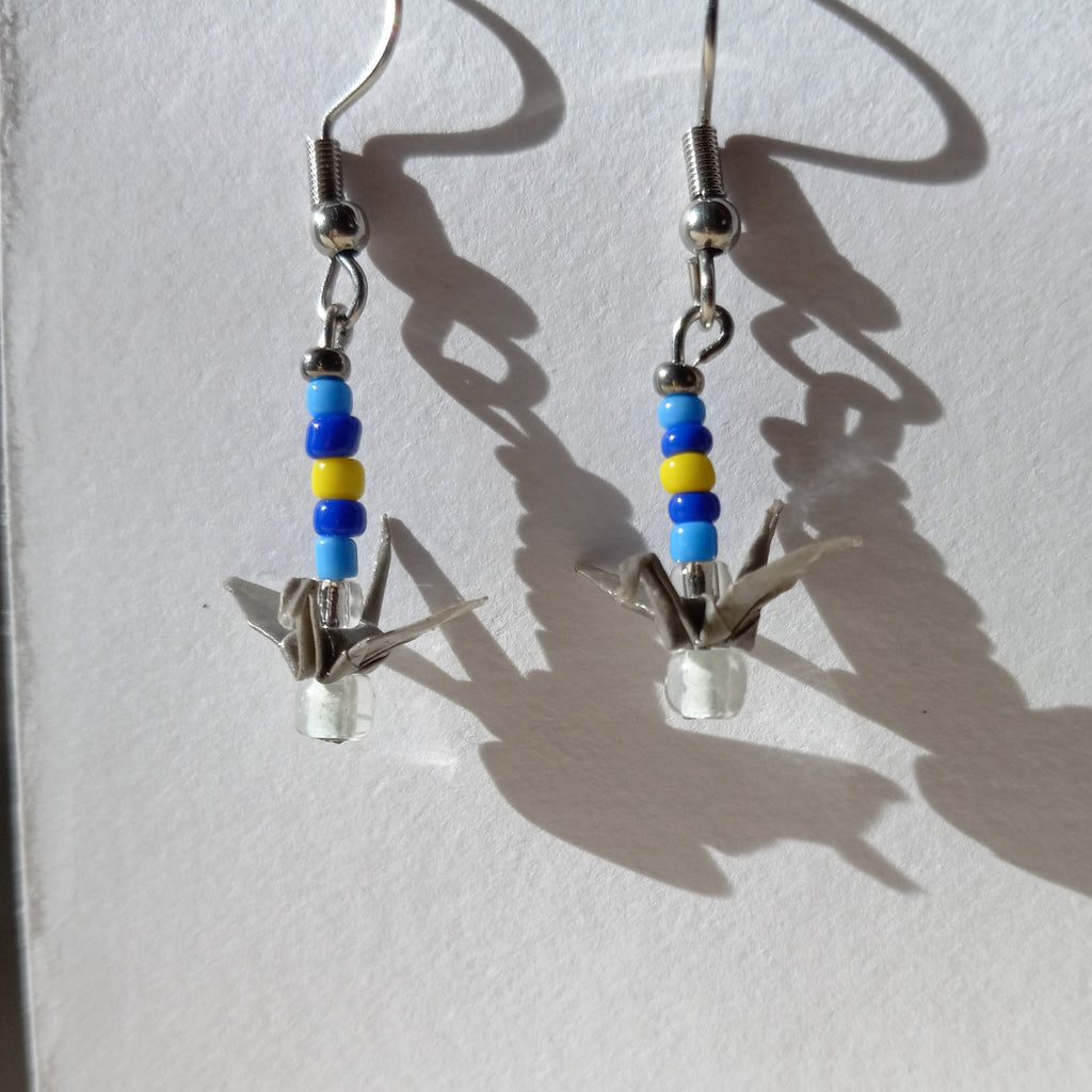 gray birds in a sunny sky