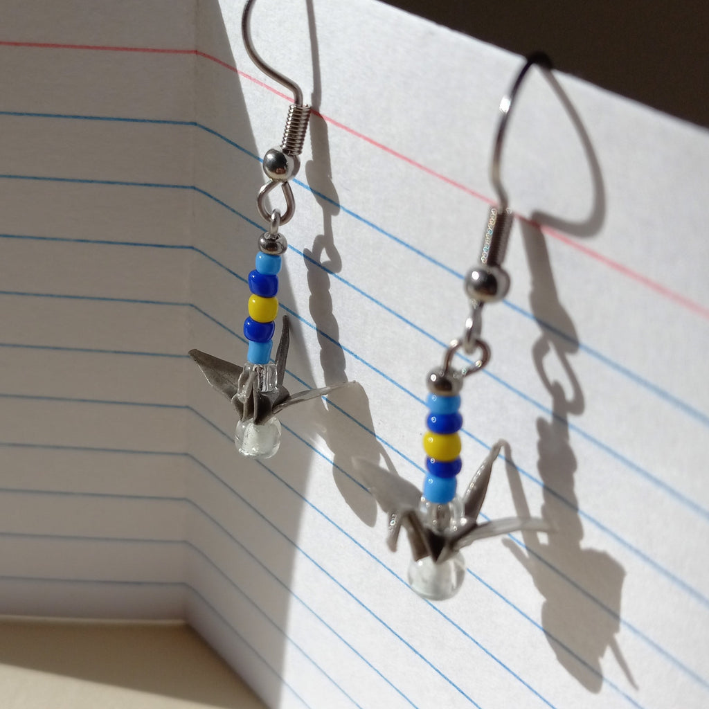 gray birds in a sunny sky